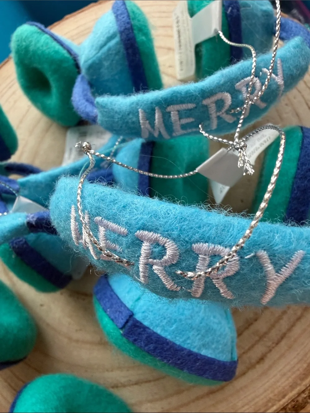 NWT Set of 5 Felt headphone ornaments embroidered w/Merry- Turquoise & Teal